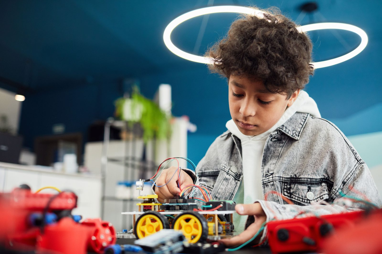 A student working on a robotics project